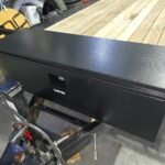Black CARVEE truck toolbox on a trailer, customer review for Monsoon Trailer Rental LLC